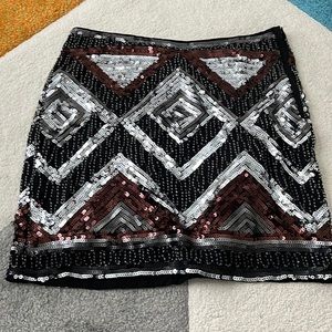 H&M black sequined mini skirt. Size 6